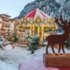 Natale in Val di Fassa: a Campitello si può salire sulla giostra dei cavalli in uno scenario da fiaba
